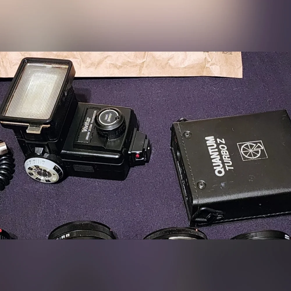 Two Canon cameras and lenses
